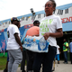 A woman leaves a recreation center after receiving free bottled water on Aug. 13, 2019, in Newark, N.J.